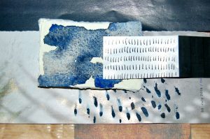 Papers with watercolour marks 