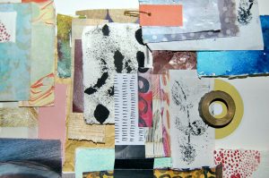 Artist's mood board showing papers cut from magazines
