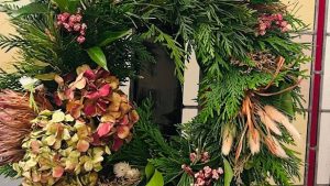 wreath on stained glass door e1760955538970
